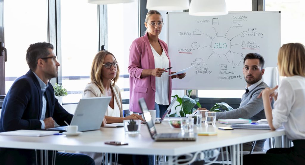 SEO Competitor Analysis in an office meeting