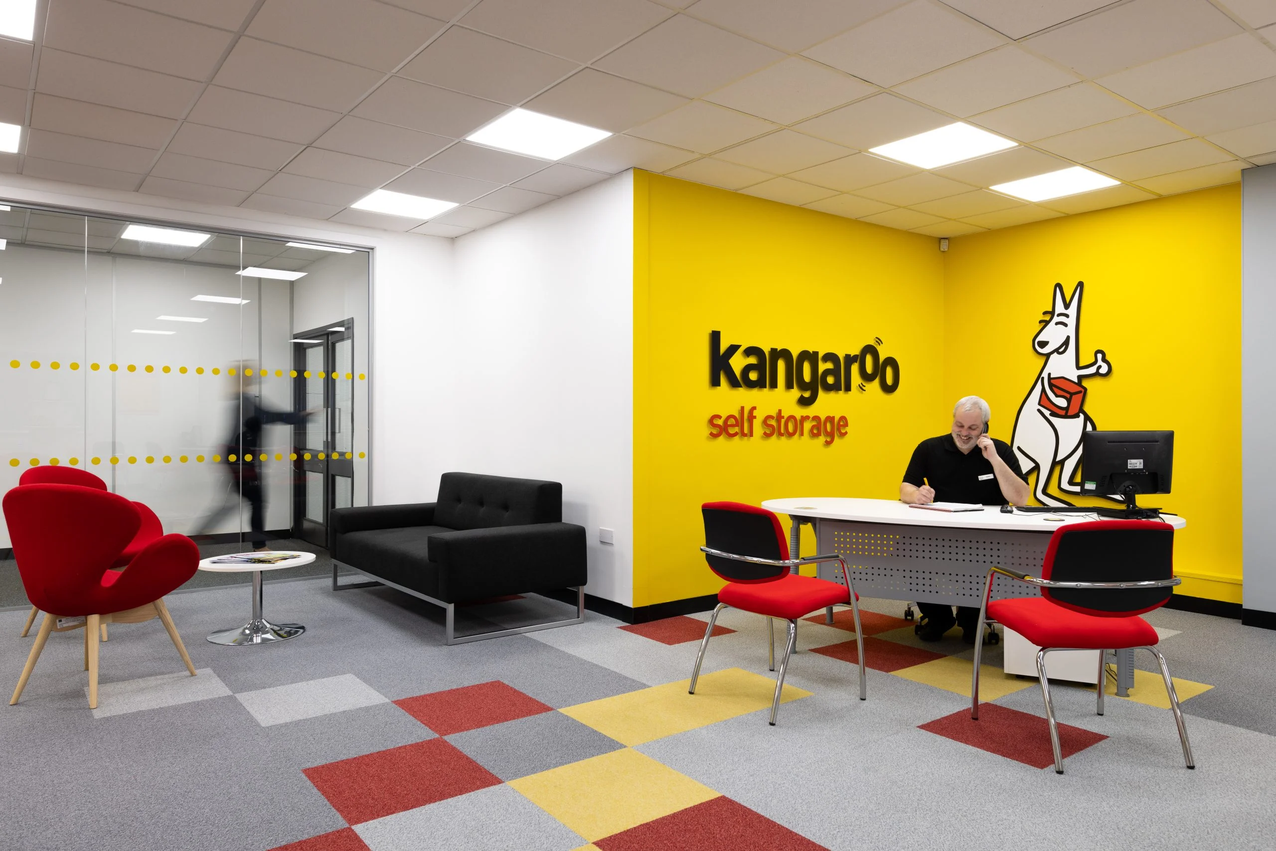 kangaroo office with a man in a table