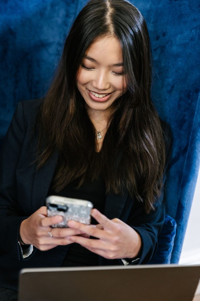 woman looking at her phone