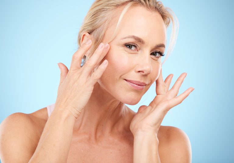 Woman, portrait and facial beauty to touch skincare.