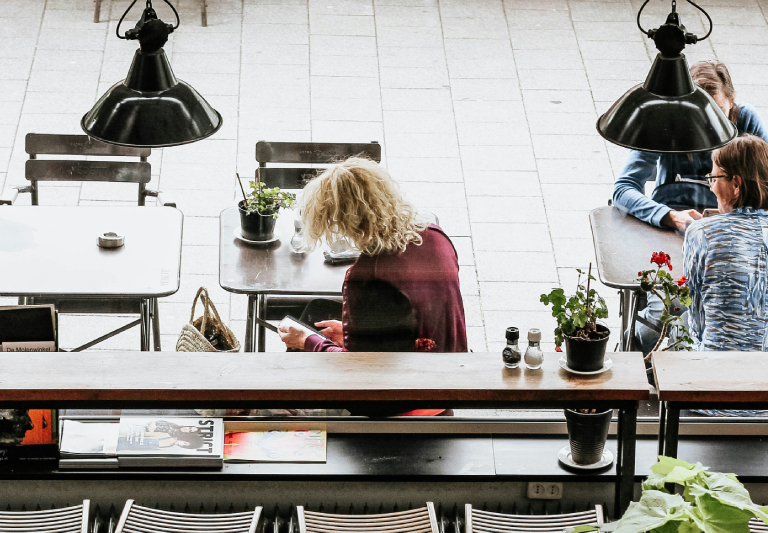 people resting in a table outsite