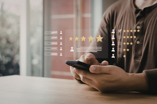 person giving five stars ratting